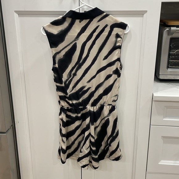 Super cute zebra print romper. Size: S - Picture 3 of 4